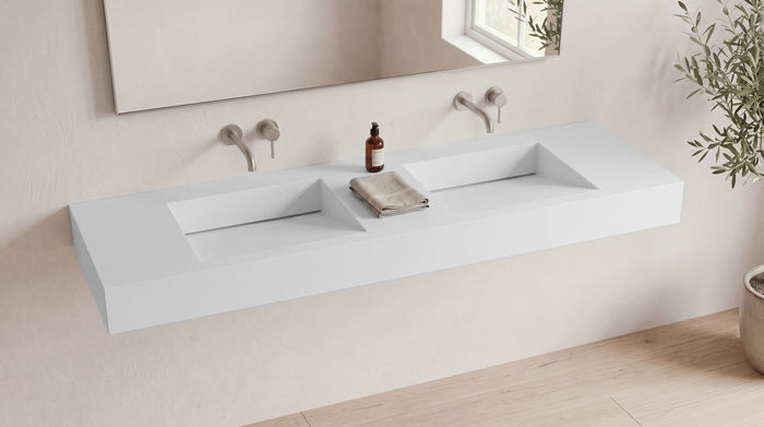 72" Double Ramp Sink, Wall Mounted in matte white stone resin, wall mounted in a bright bathroom