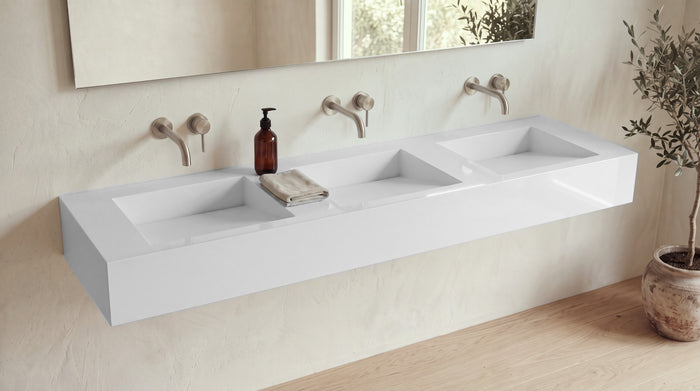 84" ADA Triple Ramp Sink, Wall Mounted in glossy white stone resin, wall mounted in a bright bathroom