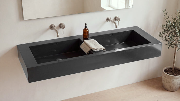 60" Double Trough Sink, Wall Mounted in glossy black stone resin, wall mounted in a bright bathroom