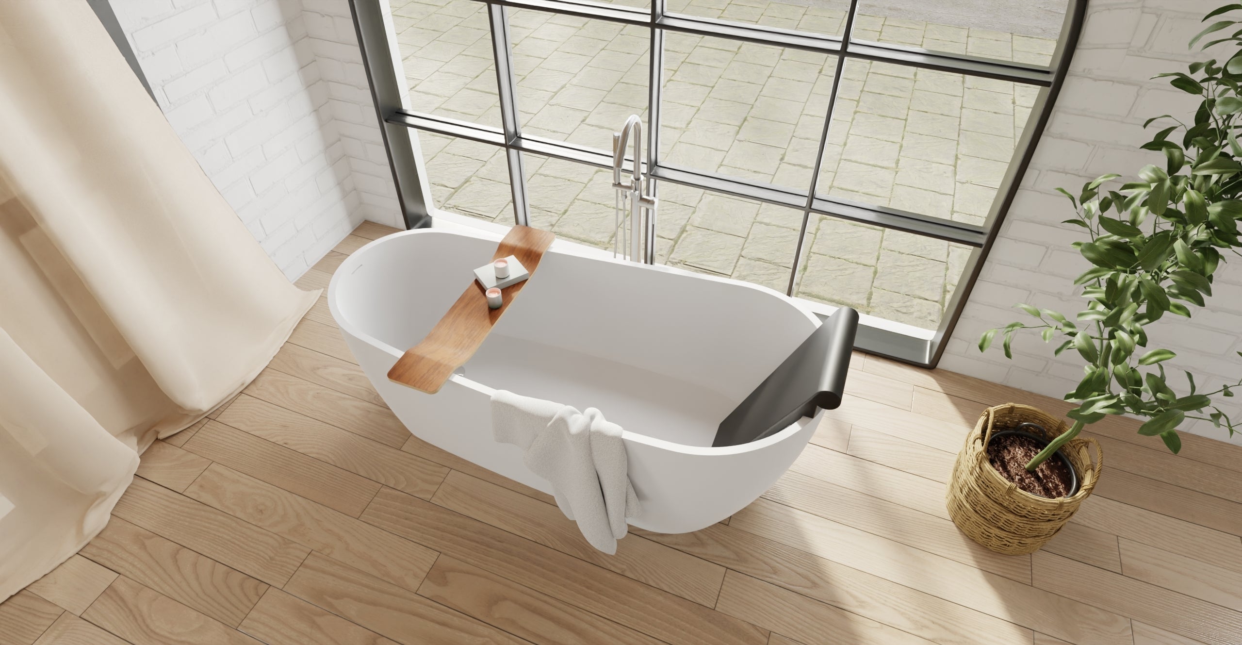 Badeloft BR-01 matte black bathtub backrest installed in a white freestanding tub, angled overhead view