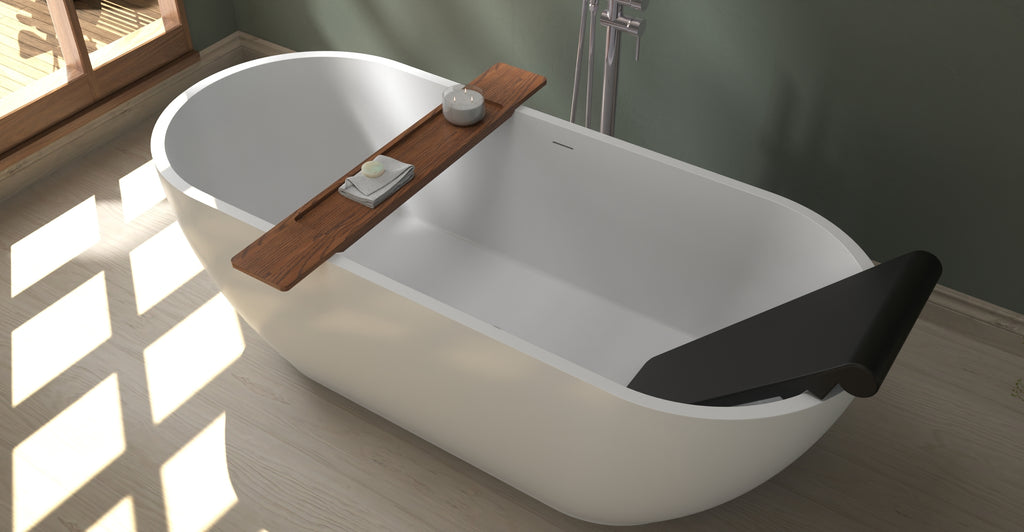Badeloft BR-01 matte black bathtub backrest installed in a white freestanding tub, close angled view