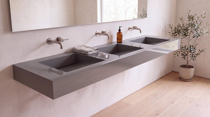 90" ADA Triple Ramp Sink, Wall Mounted in glossy grey stone resin, wall mounted in a bright bathroom