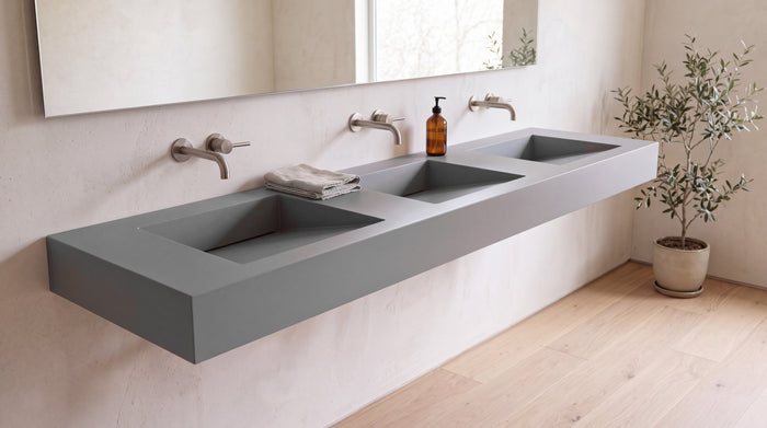 90" ADA Triple Ramp Sink, Wall Mounted in matte grey stone resin, wall mounted in a bright bathroom