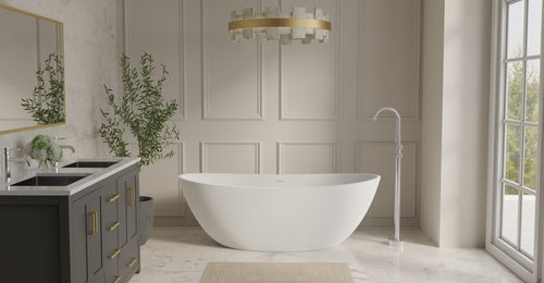 Badeloft BW-03-M freestanding bathtub in matte white in a paneled bathroom with a brass chandelier and a double vanity