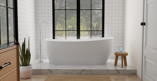 Badeloft BW-09 freestanding bathtub in white on a raised marble platform with square wall tile and paned windows