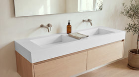 60" Double Ramp Sink, Vanity Top in matte white stone resin on a bathroom vanity