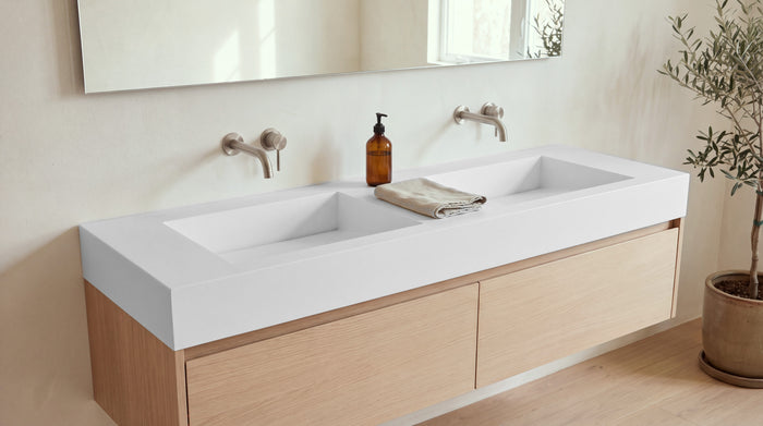 60" Double Ramp Sink, Vanity Top in matte white stone resin on a bathroom vanity