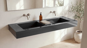60" Double Ramp Sink, Wall Mounted in glossy black stone resin, wall mounted in a bright bathroom