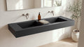 60" Double Ramp Sink, Wall Mounted in matte black stone resin, wall mounted in a bright bathroom