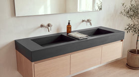 72" Double Ramp Sink, Vanity Top in matte black stone resin on a bathroom vanity
