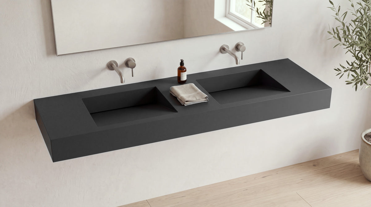 72" Double Ramp Sink, Wall Mounted in matte black stone resin, wall mounted in a bright bathroom