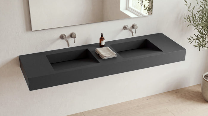 72" Double Ramp Sink, Wall Mounted in matte black stone resin, wall mounted in a bright bathroom