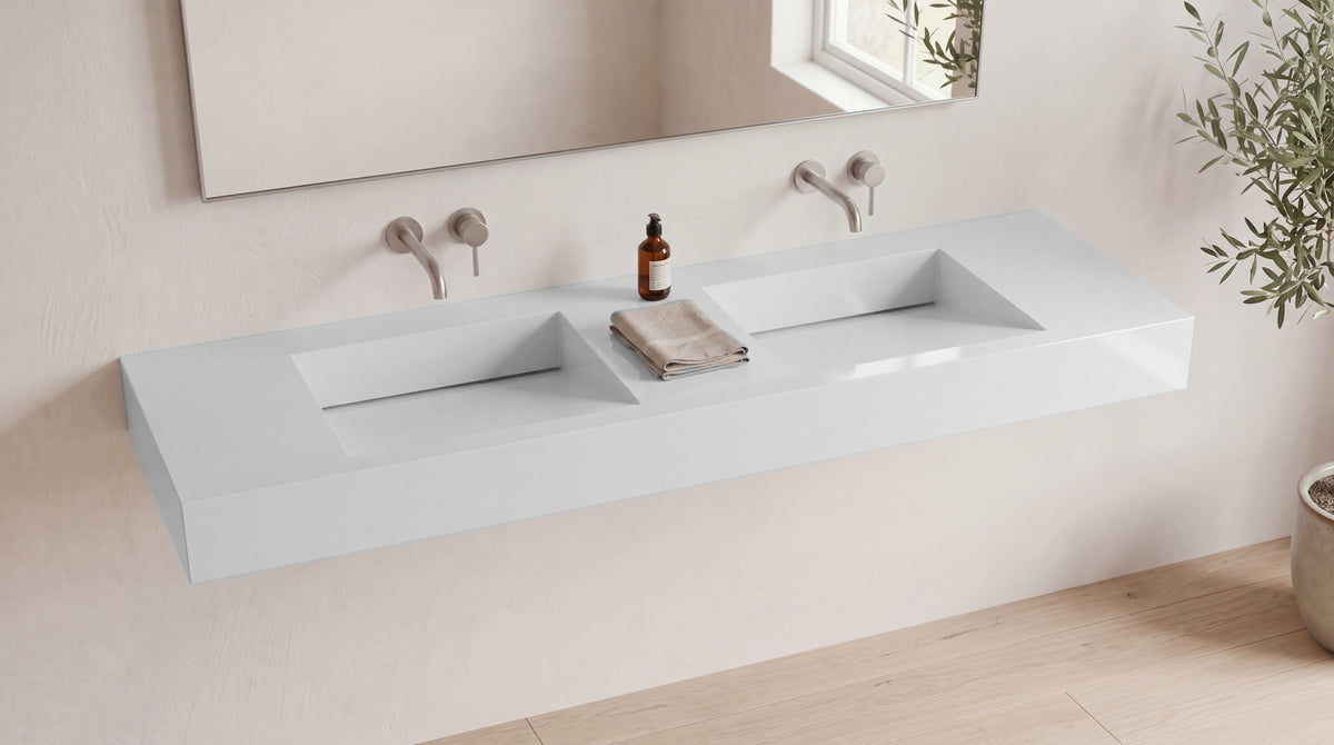 72" Double Ramp Sink, Wall Mounted in glossy white stone resin, wall mounted in a bright bathroom