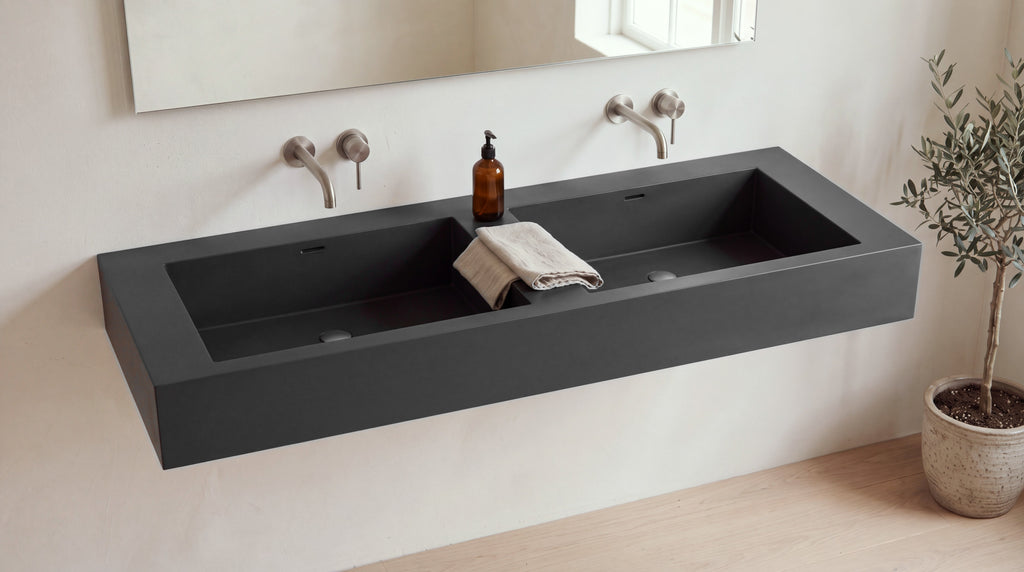 60" Double Trough Sink, Wall Mounted in matte black stone resin, wall mounted in a bright bathroom