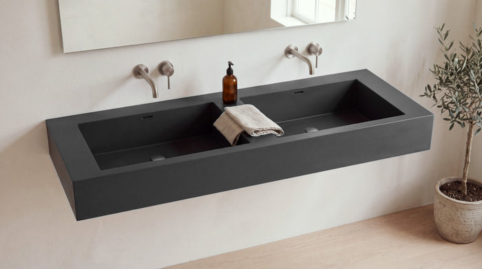 60" Double Trough Sink, Wall Mounted in matte black stone resin, wall mounted in a bright bathroom