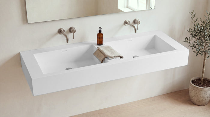 60" Double Trough Sink, Wall Mounted in matte white stone resin, wall mounted in a bright bathroom