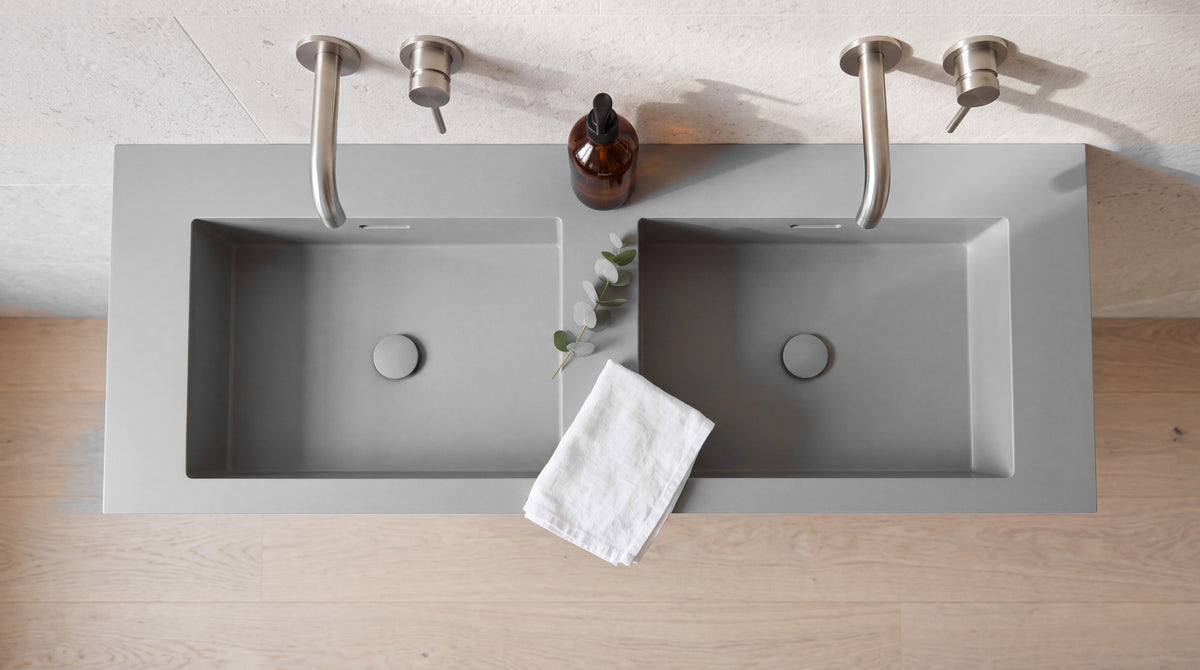 60" Double Trough Sink, Wall Mounted, top-down view of the basins and the slot drain along the back