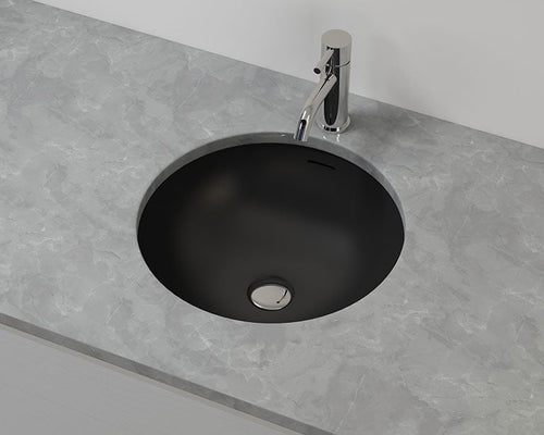 Badeloft UB-03 undermount sink in black under a stone counter with a deck-mounted faucet