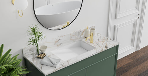 Badeloft UB-04-RL undermount ramp sink in matte white in a green vanity with a round mirror, seen from above
