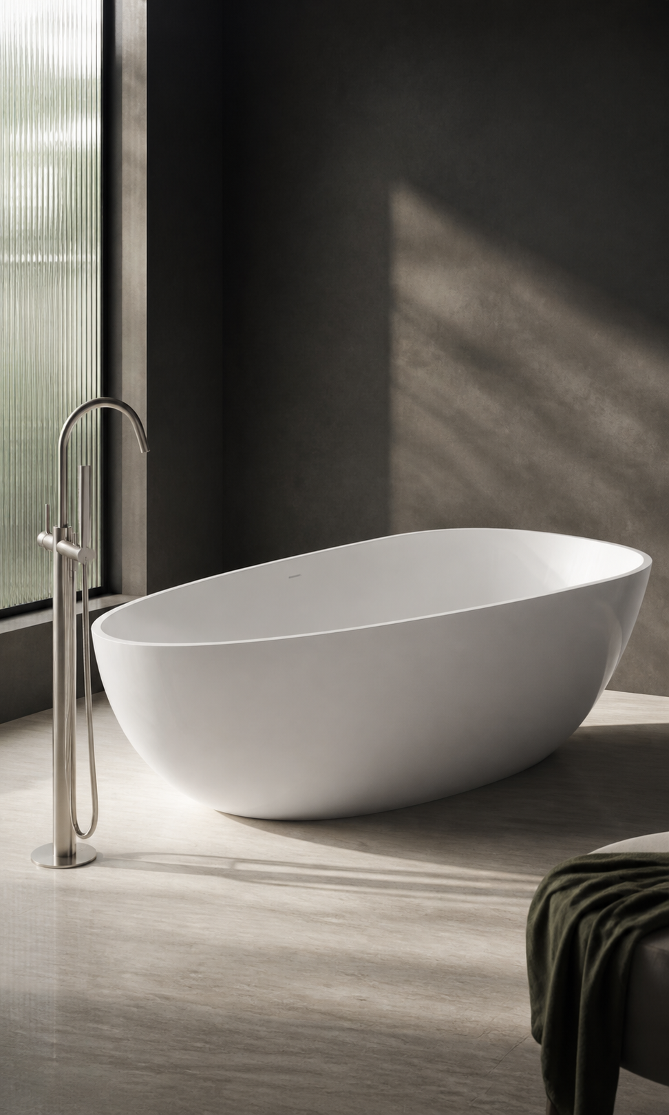 Badeloft BW-01-XL bathtub in a shadowed architectural bathroom